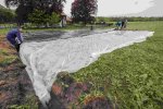 Afdekken met luchtdicht folie Afdekken met luchtdicht folie